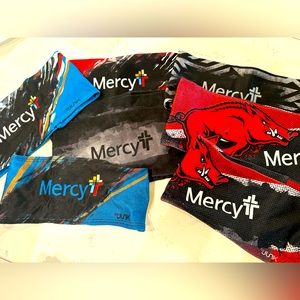 Variety of Junk headbands featuring Mercy logo